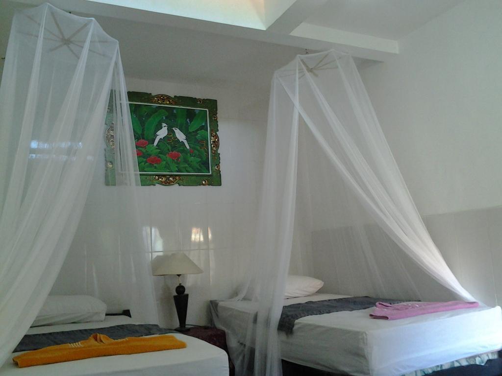 Tirta Yoga Inn ปาดังไบ ห้อง รูปภาพ